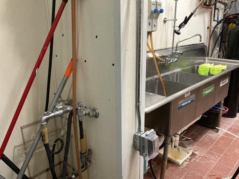 Diagnosed fluctuating water temperature issue on two commercial tankless water heaters. Inspected plumbing connections and drain assembly, identifying faulty flow sensor as the cause of temperature inconsistency. Replaced defective components and verified proper operation of both units, ensuring stable water temperature delivery to the three-compartment sink system.