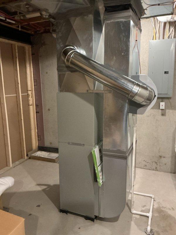 Successfully installed an AprilAire bypass humidifier on the existing HVAC system in the basement utility area, including proper mounting to the metal ductwork, connection to water supply, and drainage setup. System was tested and is functioning as designed to improve indoor air quality.