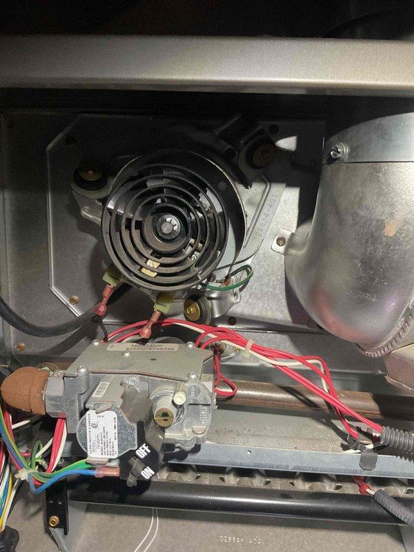 Responded to service call for water heater showing signs of tank deterioration. Upon inspection, discovered significant rust formation at base of tank and corrosion around bottom perimeter where unit contacts concrete floor. Tank appears to be under 10 years old with compromised structural integrity. Recommended replacement due to risk of failure.