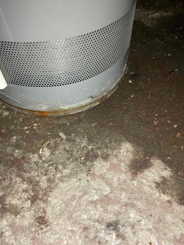 Responded to service call for water heater showing signs of tank deterioration. Upon inspection, discovered significant rust formation at base of tank and corrosion around bottom perimeter where unit contacts concrete floor. Tank appears to be under 10 years old with compromised structural integrity. Recommended replacement due to risk of failure.