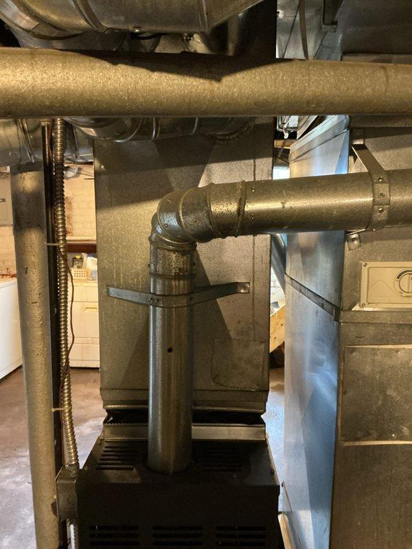 Conducted an estimate for furnace replacement at property due to water damage causing system failure. Existing Goodman furnace (15+ years old) was thoroughly inspected along with connected ductwork and ventilation components. Assessment showed significant water damage necessitating complete replacement of the basement-installed heating system.
