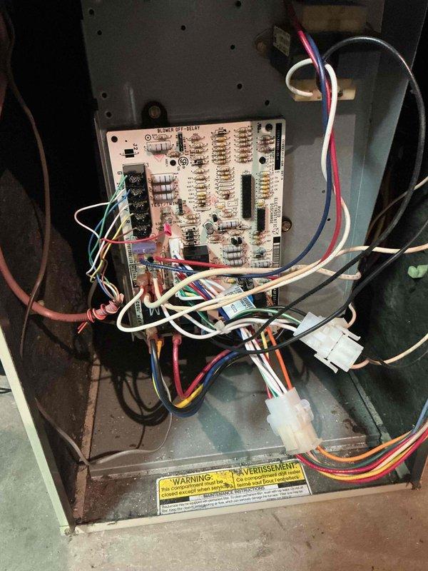 Diagnosed 20-year-old furnace failure caused by faulty control board exhibiting visible component deterioration. Replaced main control board, verified proper operation of all heating stages, and confirmed system functionality with complete operational test.