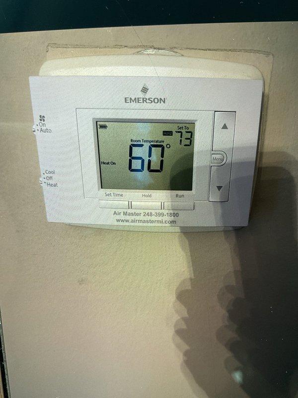 Responded to a no-heat call on a 5-year-old Lennox furnace located in the basement. Diagnostic testing revealed thermostat was properly calling for heat (set at 73°F with current temperature reading 60°F), but furnace was not responding. Upon inspection of internal components, identified and replaced a faulty ignition control module that was preventing proper startup sequence. System now operating correctly with confirmed heat production.