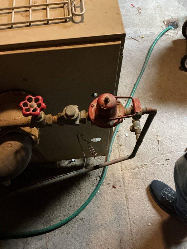 Responded to service call for 30+ year-old boiler requiring valve replacement. Upon inspection, identified corroded manual shut-off valve on copper piping system showing significant wear. Installed new valve and verified proper system operation, ensuring safe functionality of the aging heating system.