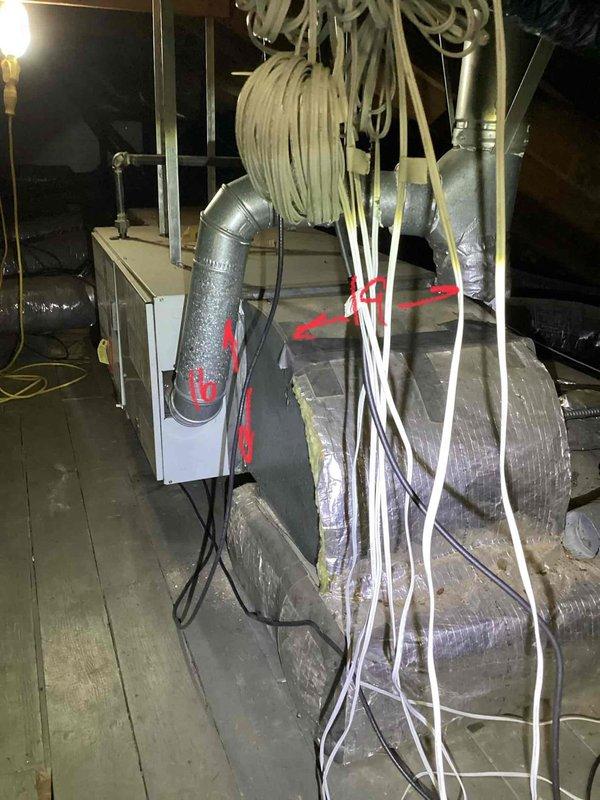 Conducted replacement estimate for 28-year-old furnace with noisy inducer motor located in attic. System inspection revealed aging ductwork with existing flexible insulated ducts connected to main air handler unit. Customer preferred full system replacement due to equipment age rather than repair of the failing motor component.