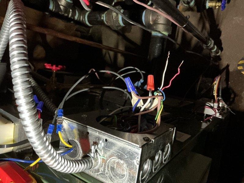 Responded to a warranty recall for a 5-month old furnace not producing heat. Inspected electrical connections at junction box and identified loose wiring connections. Secured all wire nuts properly and verified proper voltage to unit. Tested system operation after repair and confirmed furnace is now functioning correctly with proper heat output.