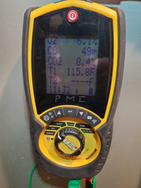 Performed diagnostic testing on 1990 furnace that was not producing heat. Combustion analyzer readings showed optimal O2 (0.1%), CO (4 PPM), and CO2 (8.4%) levels with proper flame pattern observed. Successfully restored heating function after cleaning ignition sensor that customer had previously attempted to service, bringing house temperature up from 61°F.