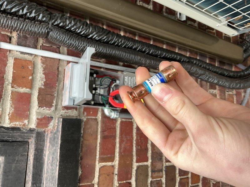 Responded to callback for newly installed mini-split system displaying "High Discharge Pipe Control" error. Performed electrical diagnostics using Fluke clamp meter, measuring 6.9A current draw at junction box, and inspected fuse integrity. System was successfully restored to proper operation after electrical troubleshooting.