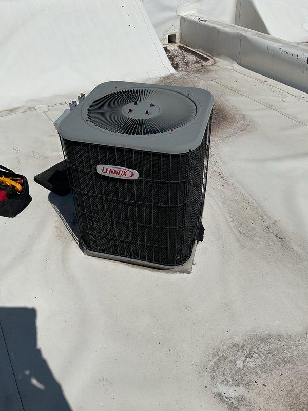Performed comprehensive Gold AC Inspection on customer's Lennox rooftop unit, documenting multiple areas of exterior panel damage with paint chipping exposing underlying material. System was thoroughly evaluated per maintenance protocol with all findings photographed for documentation purposes.