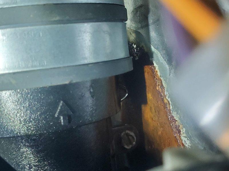 Completed Gold Furnace Inspection on forced air system located in basement. Inspected burner assembly, confirming proper flame pattern with characteristic blue flames indicating complete combustion. Identified minor rust formation at exhaust connection point requiring monitoring, but system is currently operating within normal parameters.