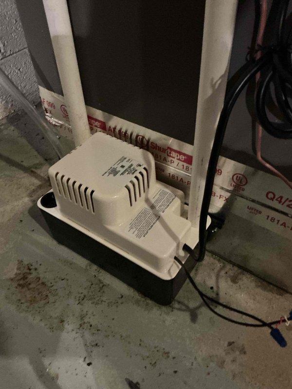 Responded to service call for recurring condensate line clogging issue on a 2-year-old furnace system. Cleared the obstructed condensate line that was preventing proper water drainage and causing backup/discharge issues. This is the second occurrence of this problem since installation despite proper customer maintenance.