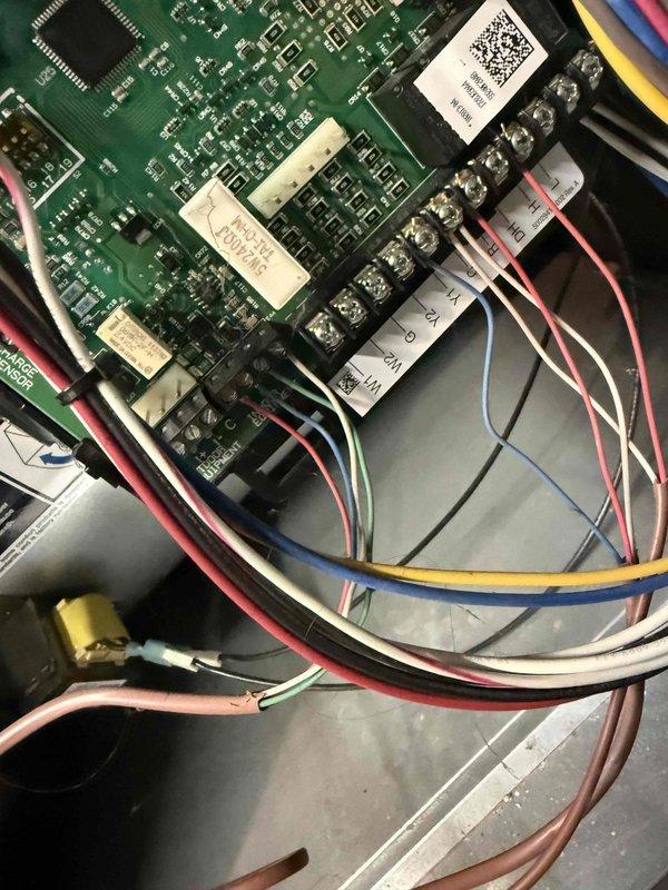 Responded to service call for non-functional thermostat. Diagnosed failed circuit board on 5-year-old Lennox thermostat located in living room. Removed existing unit, installed new compatible thermostat, and verified proper connection of all control wiring (R, Y, W, G terminals) to ensure proper system functionality.