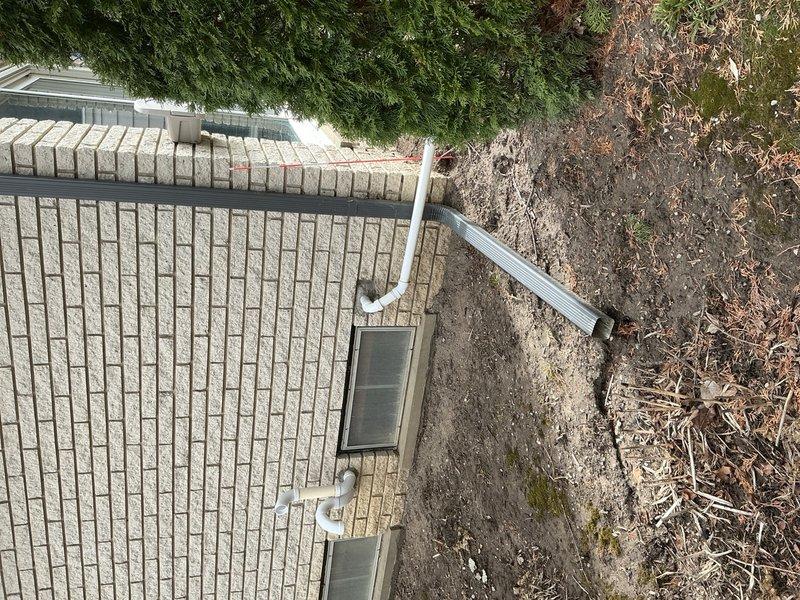 Performed diagnostic assessment on leaking Navien combination tankless water heater system. Conducted maintenance flush to remove mineral buildup and scale. Repaired leak at copper pipe connection point, replaced necessary fittings, and verified proper drainage system functionality with exterior PVC downspouts directing water away from foundation.