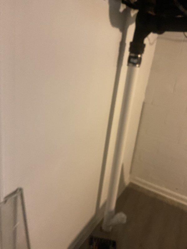 Diagnosed and repaired water leak from shower control handle in basement bathroom, which was causing issues with both hot and cold water flow regulation. Replaced faulty valve assembly and verified proper operation of new components with no further leakage observed during testing.