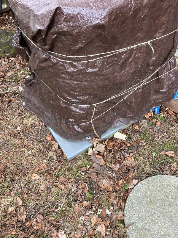 Conducted a comprehensive evaluation for replacement of 10+ year old non-operational furnace and AC system located in customer's basement. Natural gas-fueled system requires full replacement. Observed existing outdoor unit wrapped in protective tarp and documented current thermostat (White-Rodgers model) reading at 57 degrees. Customer appointment scheduled for afternoon arrival (after 1PM).