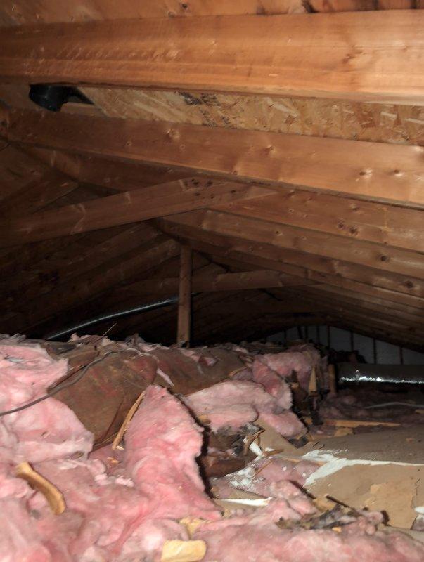 Performed electrical inspection to diagnose flickering lights and circuit overload issues. Inspected attic wiring and found evidence of outdated electrical system with improper wiring connections. Recommended panel upgrade and partial rewiring to address safety concerns and prevent further breaker trips.