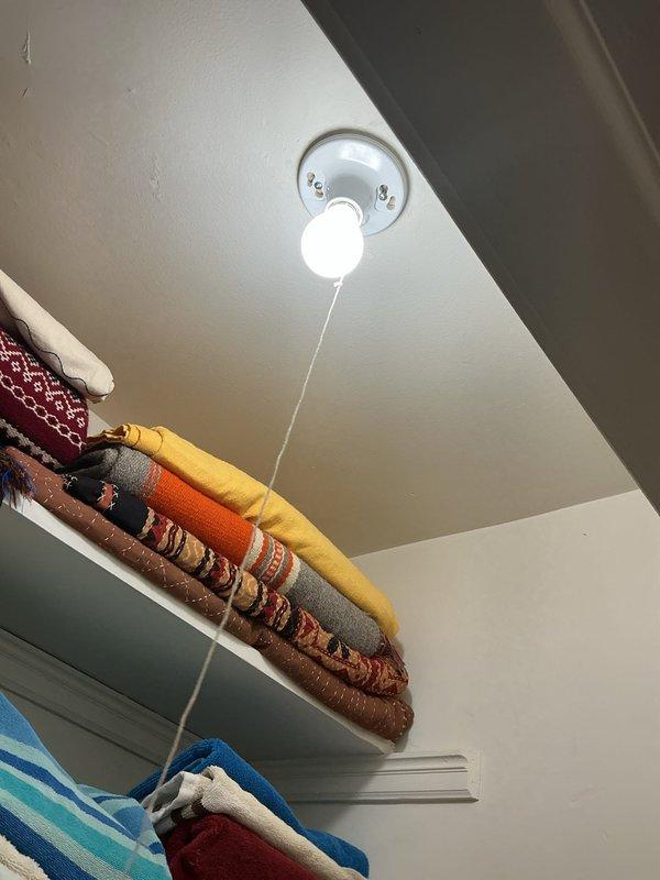 Performed electrical service in two areas: installed new pull-string light fixture in storage closet and inspected electrical panel in garage. Verified proper operation of the new fixture and confirmed all connections in panel were secure with appropriate wire routing.