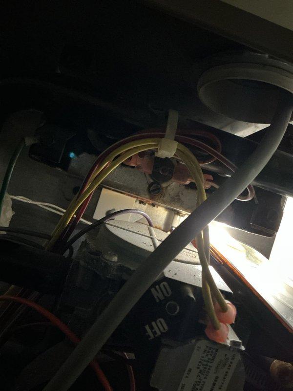 Performed routine tune-up maintenance on furnace system located in basement. Inspected internal wiring connections and condensate drainage components. Conducted combustion analysis with Testo 310, measuring O₂ levels at 6.7% and CO at 32.10 ppm, confirming system is operating within acceptable parameters.