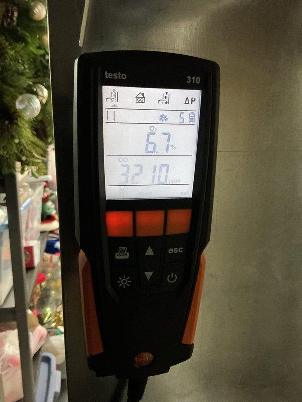 Performed routine tune-up maintenance on furnace system located in basement. Inspected internal wiring connections and condensate drainage components. Conducted combustion analysis with Testo 310, measuring O₂ levels at 6.7% and CO at 32.10 ppm, confirming system is operating within acceptable parameters.