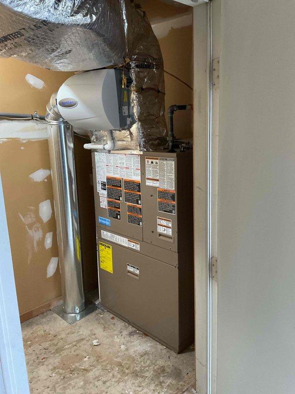 Successfully installed a complete HVAC wall unit system with integrated humidifier. System installation includes proper electrical connection to the circuit breaker panel and all ductwork. Note: Plumber needs to return to replace the under-sink ball valve to 3/8" size to complete water connection to the humidifier.