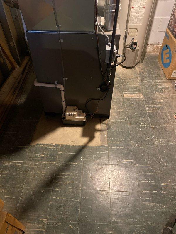 Successfully installed a 70,000 BTU furnace with integrated humidifier system in customer's basement utility room. Connected new condensate pump with proper PVC piping and reconnected all necessary electrical components. Completed mechanical and electrical work according to code requirements with permit documentation submitted.