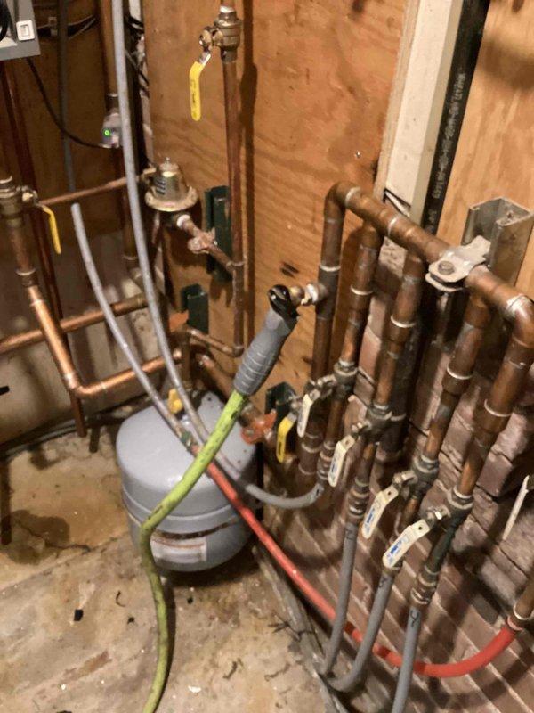 Conducted estimate for replacement of combi boiler that has experienced significant failures, including recent control board failure on the hot water side despite recent extensive repairs. Current unit is approaching warranty expiration with existing components including expansion tank, air separator, and diverter valve that would be incorporated into new installation.