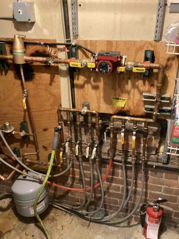 Conducted estimate for replacement of combi boiler that has experienced significant failures, including recent control board failure on the hot water side despite recent extensive repairs. Current unit is approaching warranty expiration with existing components including expansion tank, air separator, and diverter valve that would be incorporated into new installation.