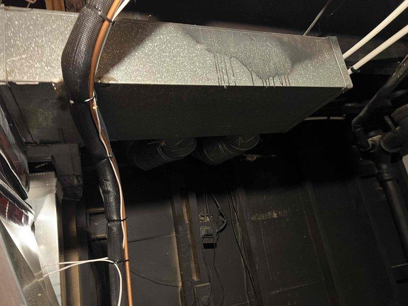 Responded to service call for uneven heating in residence with 8-month-old Goodman furnace located in basement. Diagnosed airflow distribution issue causing excessive heat in upstairs bathroom while basement remained cold. Adjusted dampers and balanced system to improve temperature consistency throughout home.