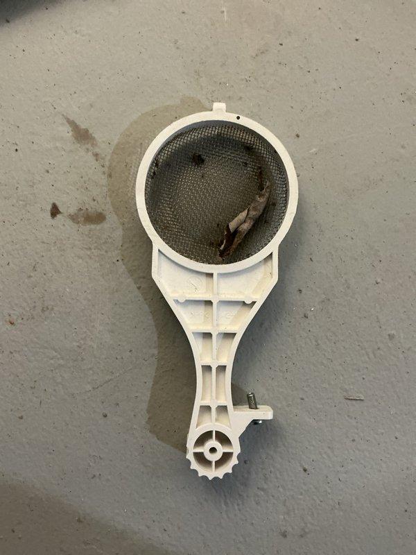 Performed a comprehensive tankless water heater flush service on a wall-mounted unit. Removed and cleaned the inlet filter screen, which contained significant debris accumulation. System was successfully flushed to remove mineral deposits, restoring optimal performance and efficiency.