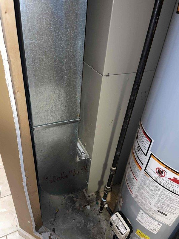 Conducted assessment of 26-year-old non-operational furnace in basement requiring replacement. Inspection revealed aging Lennox unit with significant wear on connection points and visible corrosion on pipe fittings. Recommended full system replacement due to equipment age and condition.