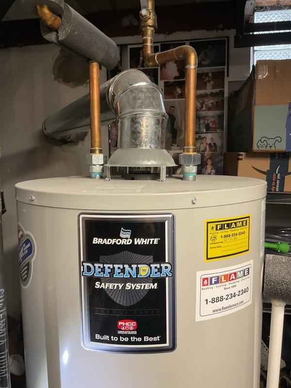 Completed Gold Furnace Inspection on 7-year-old forced air system located in basement. Inspected air filter/evaporator coil assembly, noting some discoloration indicating maintenance may be needed soon. Also observed Bradford White water heater with proper copper piping connections and ventilation components in good working condition.