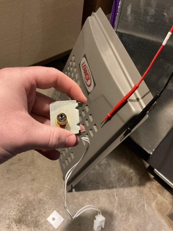 Responded to no-heat call after power outage for 2-year-old Lennox furnace. Inspected control board connections and found loose flame sensor terminal causing system failure. Reconnected and secured flame sensor wiring, then verified proper ignition sequence and system operation through multiple heating cycles.