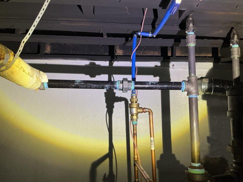 Completed comprehensive repair of boiler pipe system in utility area. Addressed and replaced compromised sections of both black metal and copper piping, installing new brass fittings and valves to ensure proper flow. Successfully restored full functionality to the heating system with all connections properly sealed and tested.