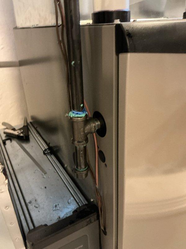 Responded to a gas leak report on a furnace identified and tagged by the utility company. Conducted a thorough inspection of the HVAC system, focusing on brass fittings and copper pipe connections where blue thread sealant had been applied. Performed pressure testing on the gas line system and repaired leaking connections at the equipment entry point and ceiling junction, ensuring proper sealing and safe operation of the heating system.