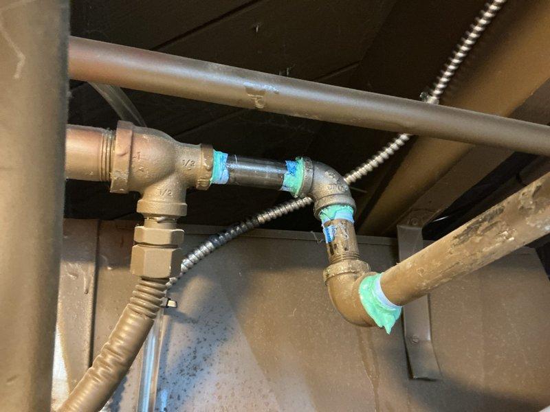 Responded to a gas leak report on a furnace identified and tagged by the utility company. Conducted a thorough inspection of the HVAC system, focusing on brass fittings and copper pipe connections where blue thread sealant had been applied. Performed pressure testing on the gas line system and repaired leaking connections at the equipment entry point and ceiling junction, ensuring proper sealing and safe operation of the heating system.