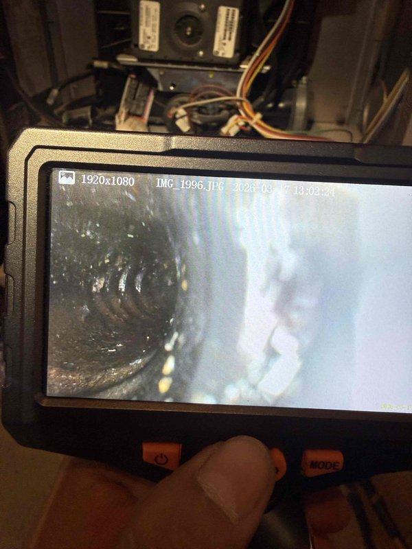 Diagnosed fan speed issue on 10-year-old furnace that was operating only on low speed while still providing heating/cooling. Performed PCB inspection and used borescope to examine internal components. Identified faulty control board relay affecting fan speed operation. System otherwise functioning properly.