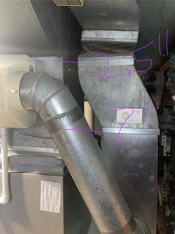 Conducted comprehensive evaluation of a 2004 Carrier furnace with failed inducer motor. Inspected existing ductwork system, noting significant wear on galvanized components and condensation staining on vertical surfaces. Provided replacement estimate for the aging system which had stopped heating after customer's unsuccessful attempts to address ignition sensor issues.