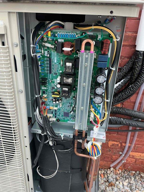 Returned to residence to replace control board and install surge protector on outdoor HVAC condensing unit. Successfully installed new circuit board (previously stored at shop) and added surge protection to safeguard electrical components, completing repair for customer with newborn in home.