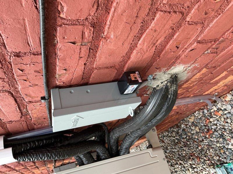 Returned to residence to replace control board and install surge protector on outdoor HVAC condensing unit. Successfully installed new circuit board (previously stored at shop) and added surge protection to safeguard electrical components, completing repair for customer with newborn in home.