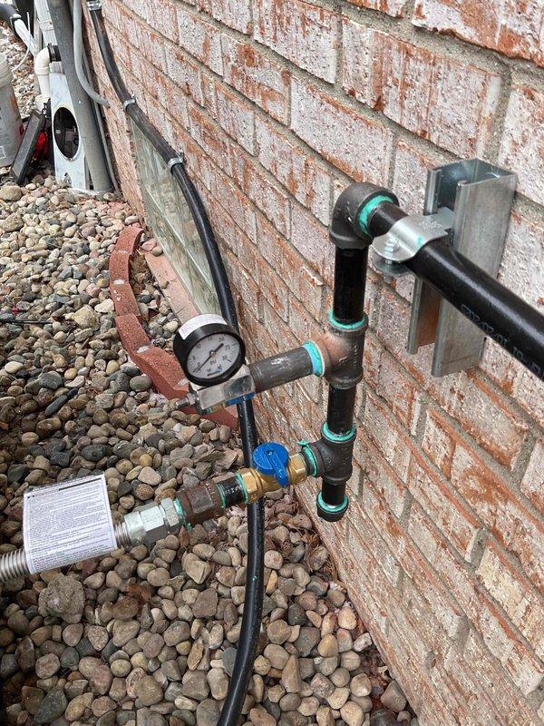Successfully installed a 14kW generator system, including all mechanical, electrical, and gas piping components. Completed pressure testing of the gas line (reading +6.605 on UEi EM201B meter) and installed transfer switch. All connections were properly secured with appropriate brackets and fittings, with system verified operational per manufacturer specifications.