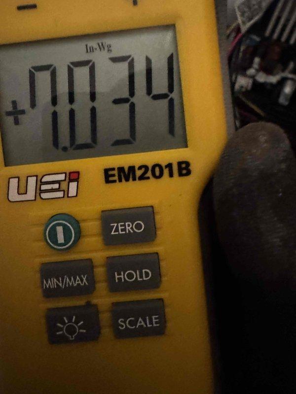Successfully installed a complete HVAC system including a 70,000 BTU furnace, 2-ton air conditioning unit, S40 thermostat, and 500M humidifier with pump. Performed pressure testing with UEi EM201B manometer, confirming proper system pressurization with readings of 0.34 In-Wg and 35.11 In-Wg at measurement points. System installation completed with all electrical connections and mechanical components properly secured.
