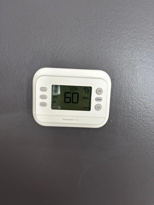 Successfully installed a complete HVAC system consisting of a 110,000 BTU furnace and 4-ton AC unit with AHRI reference #215666926. Installation included mounting a new Honeywell Home digital thermostat, connecting PVC drainage system, and installing a humidifier. All mechanical, plumbing, and electrical connections were properly completed with consumer rebate eligibility verified.