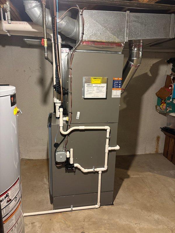 Successfully installed a complete HVAC system consisting of a 110,000 BTU furnace and 4-ton AC unit with AHRI reference #215666926. Installation included mounting a new Honeywell Home digital thermostat, connecting PVC drainage system, and installing a humidifier. All mechanical, plumbing, and electrical connections were properly completed with consumer rebate eligibility verified.