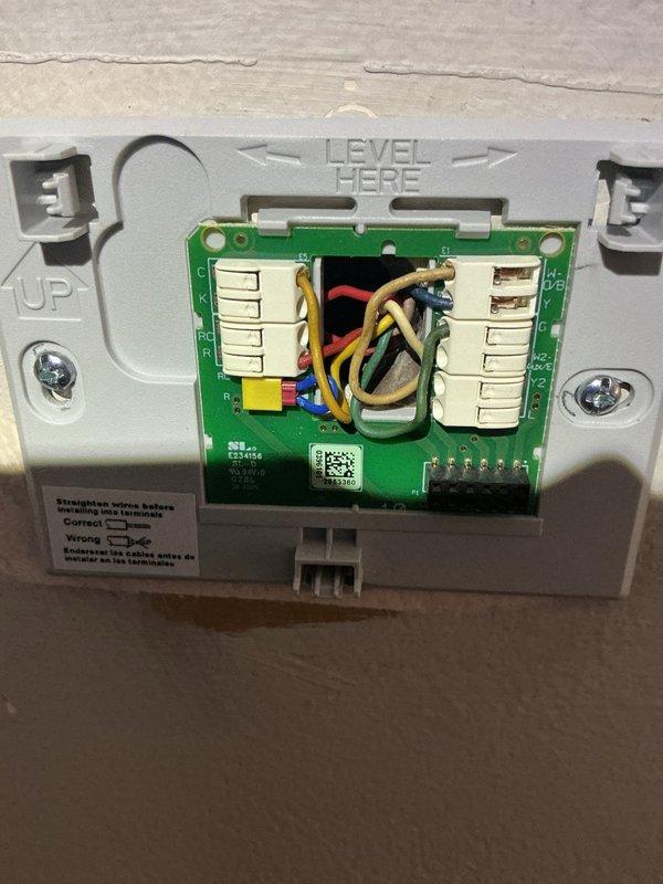 Responded to callback regarding thermostat control issues with humidifier. Inspected existing 5-year-old thermostat in living room which was non-functional. Removed and replaced thermostat, ensuring proper wiring connections and level installation. Verified proper operation of new unit and confirmed humidifier control functionality was restored.