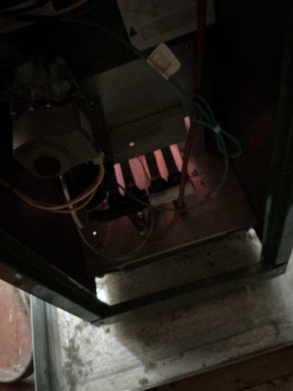 Responded to a callback for a 12-year-old boiler system with reported water leakage and insufficient heating. Customer reported temperature drop from set point of 72°F to 62°F overnight. Diagnostic inspection revealed low system pressure as indicated on pressure gauge. Restored proper pressure, verified burner operation, and confirmed system was heating correctly before completing service.