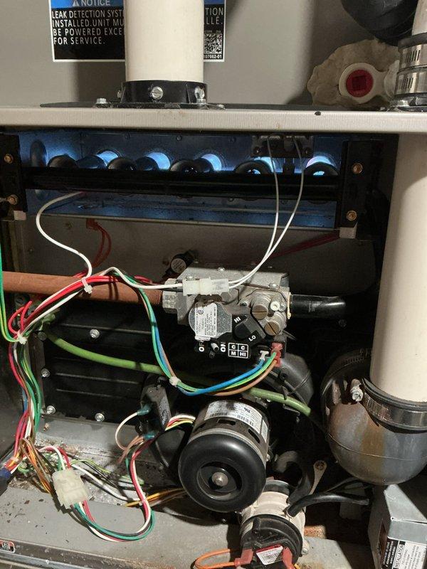 Responded to service call regarding thermostat issue. Inspected furnace system, including gas valve assembly, burner components, and associated electrical connections. Customer advised to monitor thermostat performance and will reschedule service in February/March if problem persists.