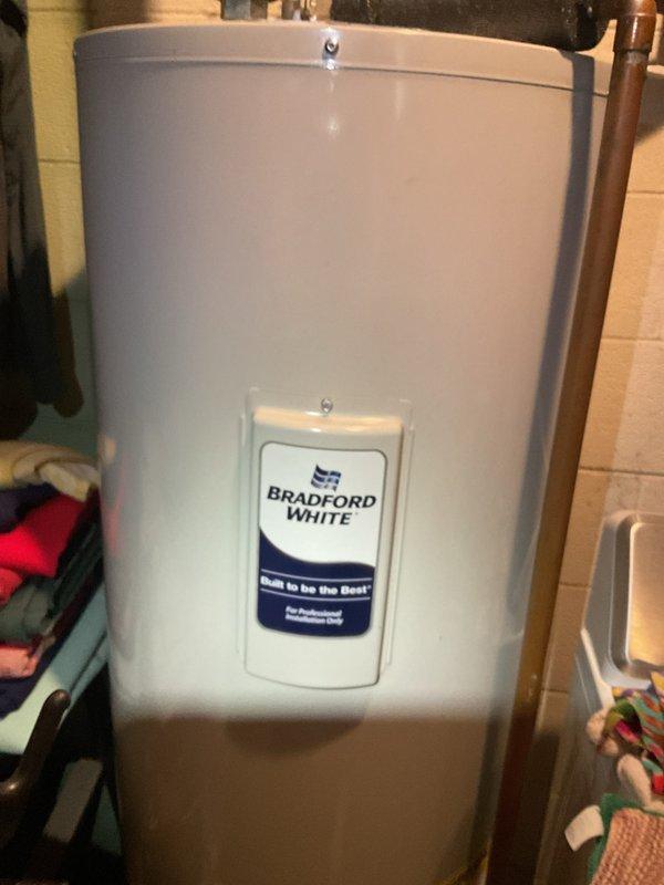 Performed Gold Furnace Inspection on 24-year-old basement furnace. Conducted electrical diagnostic testing with UEi clamp meter on blower motor and verified proper amperage readings. Inspected capacitor and wiring connections throughout system. Also noted Bradford White water heater in utility area during service visit.