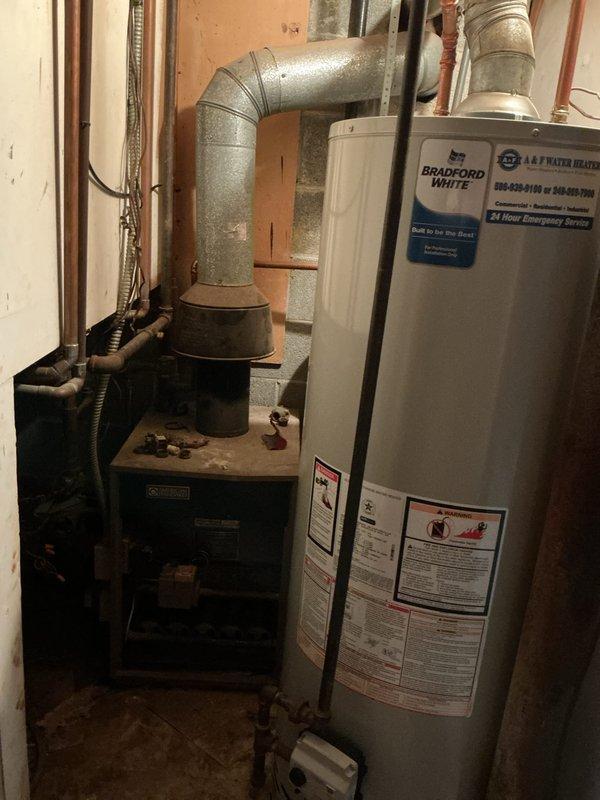 Conducted diagnostic assessment on 50+ year old hot water boiler system producing high carbon monoxide levels. Inspection revealed severely aged American Standard unit with significant safety concerns. Recommended replacement rather than repair due to age of equipment and dangerous CO emissions.