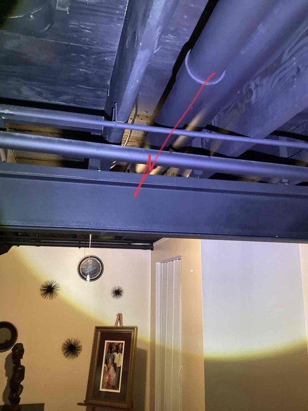 Conducted an estimate for replacement of an existing gas furnace located in the basement. Current Amana unit is operational but age is unknown. Inspected and documented the existing PVC vent pipe configurations (2" diameter) with multiple turns and connections, and measured critical dimensions (19½" and 14") for proper replacement sizing. Evaluated ceiling clearance and existing ductwork to ensure compatibility with potential replacement systems.