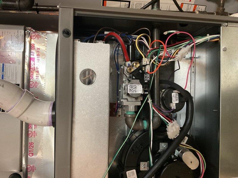 Completed installation of a 90,000 BTU Lennox furnace with proper mechanical and electrical connections. System includes integration with existing S40 thermostat and condensate pump, with repairs made to address water leak. All PVC venting properly secured with connections to existing ductwork, and system verified operational with appropriate rebate documentation processed.